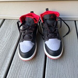 Jordan Kids Black, White, and Red Midtop Sneakers